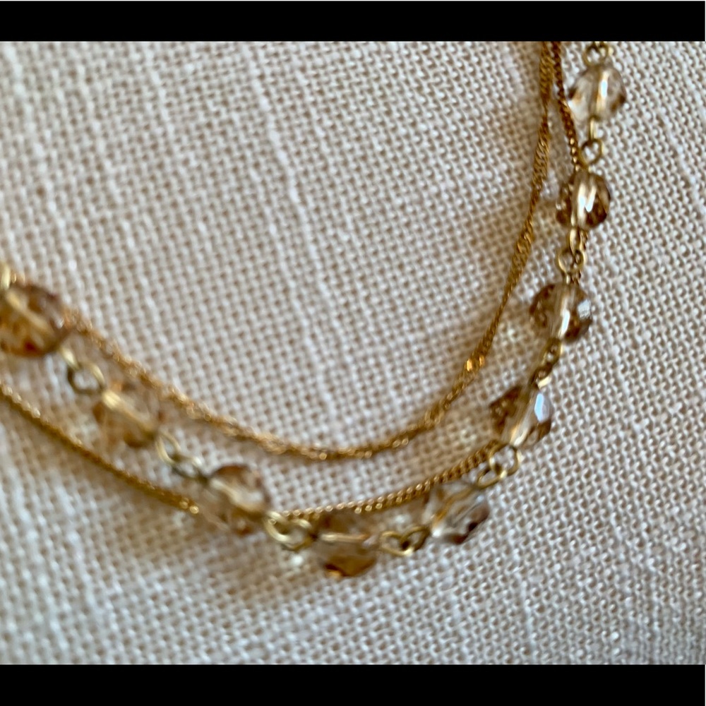 Three strand gold necklace